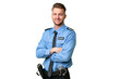 © luismolinero - Young police man over isolated background with arms crossed and looking forward