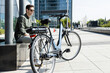 businessman rides e-bike