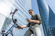 businessman rides e-bike