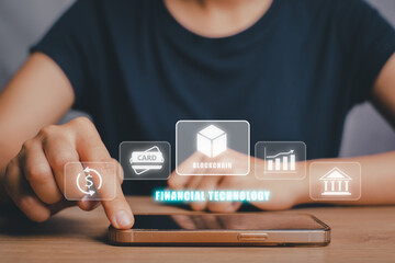 Fintech Financial technology Cryptocurrency investment and digital money, Business person using smart phone on office desk with Fintech icon on VR screen.