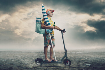 Wall Mural - Tourist riding an electric scooter in a desert land