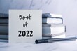 Best of 2022 inscription on white card. 2022 Overview, highlights of the year concept.