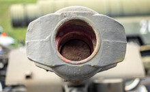Tank Gun Or Barrel. Muzzle Or Flash Hider Close-up.