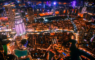 Canvas Print - Dubai city at night, view with lit up skyscrapers and roads.  