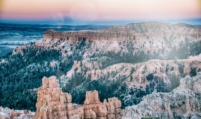 Wall Mural - Aerial view of Bryce Canyon at summer sunset. Overlook of orange colorful hoodoos red rock formations in Bryce Canyon National Park, Utah - USA.