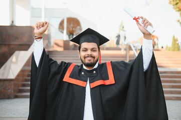 portrait of indian graduate student