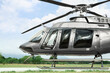 Beautiful modern helicopter on helipad in field