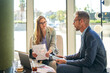 © Cavan Images - Teamwork in a business meeting