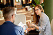 © Cavan Images - Business man and woman coworkers