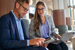 © Cavan Images - Business man and woman coworkers. business people together