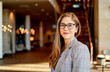 © Cavan Images - Successful business woman in the office with copy space.