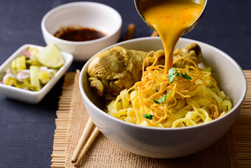 Canvas Print - Northern Thai food (Khao Soi), Spicy curry noodles soup with chicken, Local Thai food