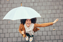 Black Woman, Umbrella And Rain With Smile, Happy And Enjoy Weather In City Being Wet. Winter, Young Female And Happiness For Storm, Cheerful And Joyful With Cover, Comfortable And Rainy Outdoor.
