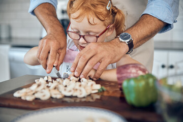 Canvas Print - Kid, dad and cooking, cutting board and food in kitchen, family home or house for childhood fun, learning and development. Parent helping little girl chop mushroom vegetables for lunch or dinner meal