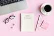 © Pattarisara - Flat lay of computer, a cup of coffee, glasses and office stationary of businesswoman on pink desk in office. Business and technology, to-do list on 2023. Top view and copy space for text