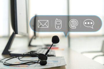 Call center customer support hotline phone services agen working with headset icon contact us and computer at call center.contact us concept