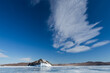 Winter landscape with frozen lake and sky. Beautiful cloud sunny weather. Baikal.