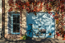 Switzerland, Basel-Stadt, Basel, Bicycle In Front Of House In Autumn