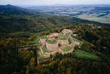 Srebrna Gora fortress and Sudety mountains at autumn season, aerial drone view. Military fort landmark for tourists in Lower Silesia, Poland