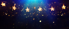 Christmas Warm Gold Garland Lights Over Dark Background With Glitter Overlay