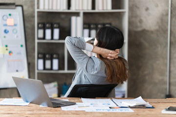 Wall Mural - Stressed Asian business woman worry about marketing plan of this years. Account, Real Estate Agent, Finance concpet