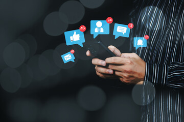 Wall Mural - Social media technology concept, man hand using smartphone Login to the online network Use social media to do business and marketing payment from home through the Internet.