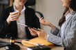 © Nuttapong punna - Business and Female lawyer or judge consult having team meeting with client, Law and Legal services concept.Customer service good cooperation in office