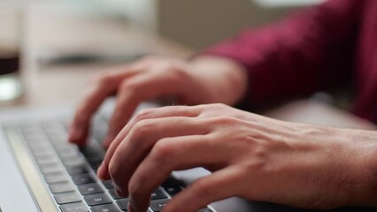 Wall Mural - close up of freelancer's developer hands typing program code on laptop keyboard in coworking. busine