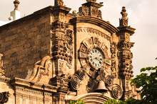 Building Facade With Neogothic Architecture, With Old Clock And Bells In Guadalajara, Mexico.