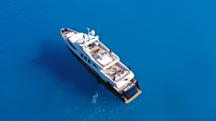 Wall Mural - Aerial drone photo of large luxury yacht anchored in paradise Mediterranean bay with turquoise crystal clear sea