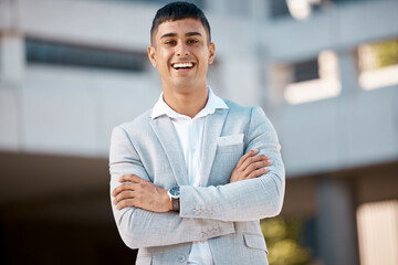 Happy, portrait and proud business man in a city, excited about vision for future and startup goal. Happy, entrepreneur with a positive mindset, standing in power and enjoying his career in London