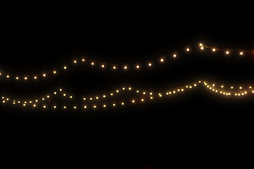 Gold abstract christmas bokeh on black background