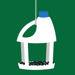 Wall Mural - Bird feeder from a plastic canister