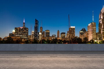 Wall Mural - Empty urban asphalt road exterior with city buildings background. New modern highway concrete construction. Concept of way to success. Transportation logistic industry fast delivery. Chicago. USA.