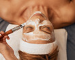 © Wesley JvR/peopleimages.com - Black woman, beauty and spa face mask for wellness therapy, clean skincare and relax in healing salon. Therapist brush facial cream cosmetics on lady in holistic detox, healthy and luxury zen holiday