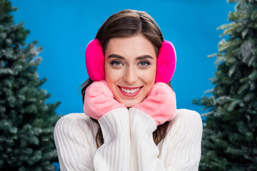 Poster - Photo of sweet cute lady wear fluffy pink earphones gloves enjoying xmas time isolated blue color background