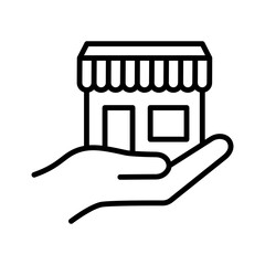 Wall Mural - Hand holding shop building. Pictogram isolated on a white background.