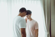 © ND STOCK - Two gay Asian men in the bedroom consoling support each other on. concept Happy lifestyle and happy house Embrace homosexuality. make a men love scene ,LGBT gay couple relationship lifestyle concept