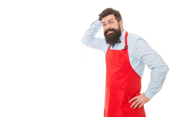 Confused professional small business owner entrepreneur scratching head in confusion in red apron