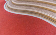 © Nature Peaceful  - Red rubber floor and curve pebble stairs well space for text