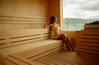 © BGStock72 - Young woman relaxing in the sauna