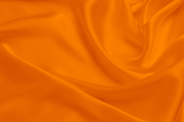 Wall Mural - Orange fabric texture background, detail of silk or linen pattern.