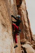 woman trad climbing crack climbing in indian creek moab utah