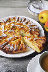 Wall Mural - Apple pie and cup of coffee, powdered sugar dressing