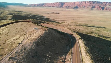 Canvas Print - Road across the canyon mountains, aerial view from drone.