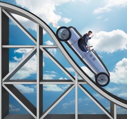 Wall Mural - Businessman driving sports car on roller coaster