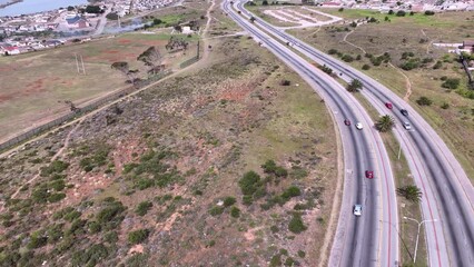 Wall Mural - Aerial view of cars seen driving along road