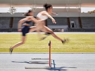 Sticker - Woman, sports and hurdle athletics running for exercise, training or workout at the stadium track outdoors. Fitness women athletes in competitive sport jumping over hurdles for healthy cardio outside