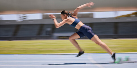 Canvas Print - Athlete, running and sports track with a woman outdoor for fitness, exercise and training for a race, marathon or competition. Runner moving fast with speed and energy during workout for performance