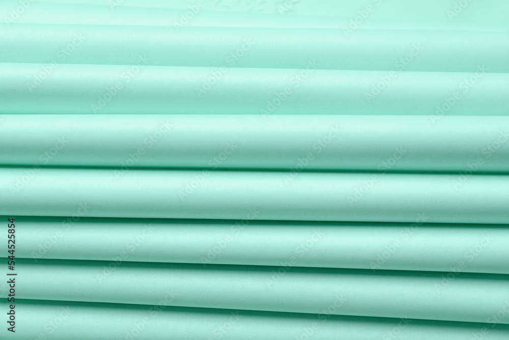 Closeup view of folded paper sheets as background